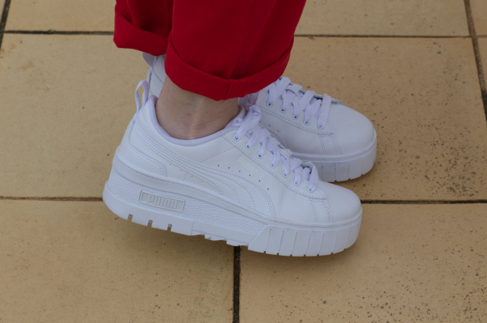 White platform Puma sneakers